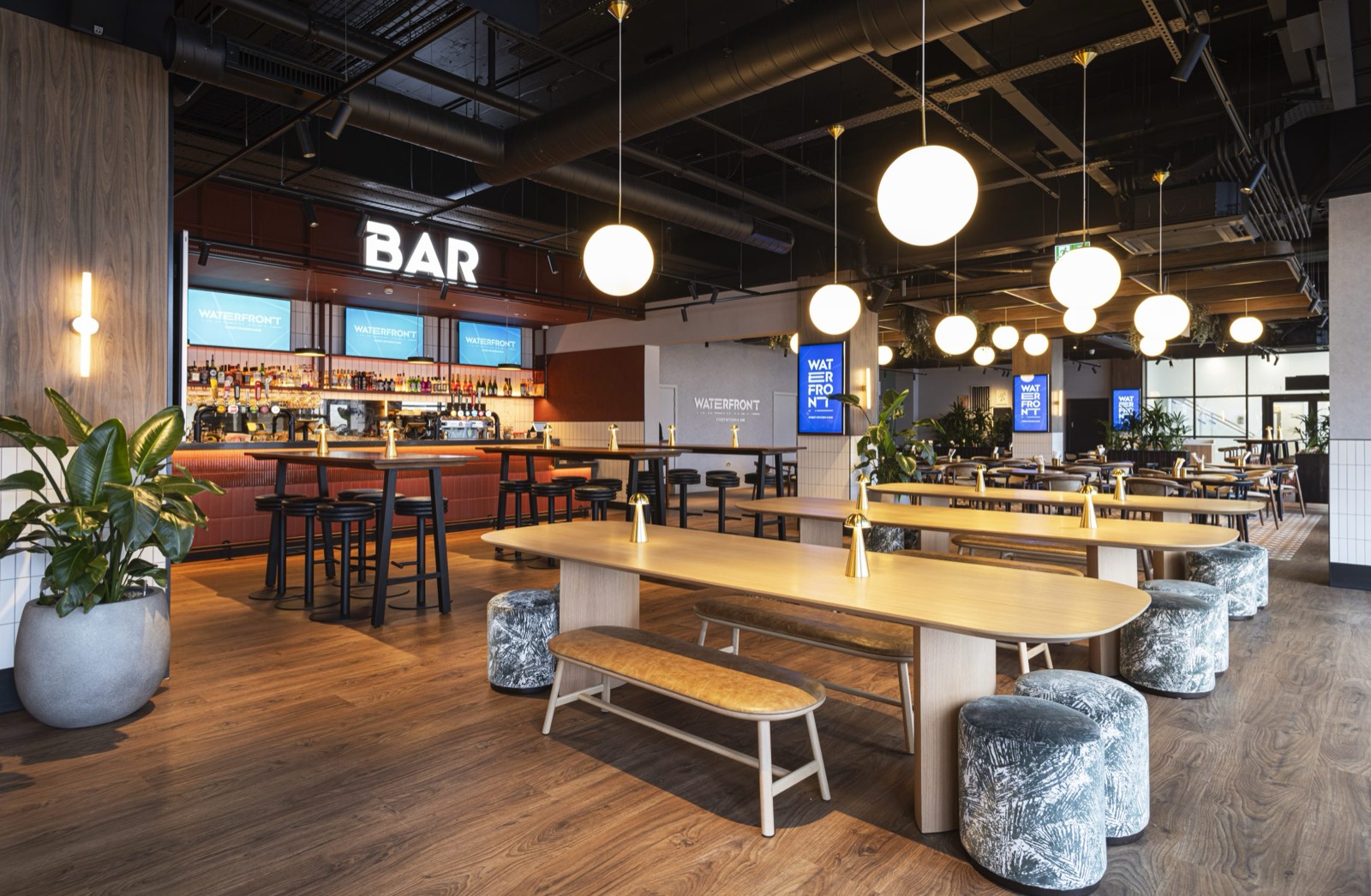 The main bar and communal tables at Waterfront Street Kitchen & Bar